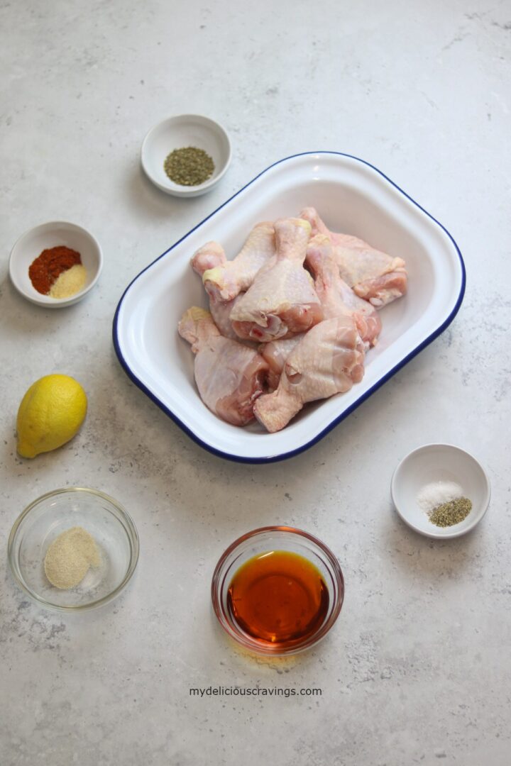 ingredients to make marinated chicken drumsticks  on the counter.
