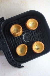 4 Yorkshire puddings in an air fryer.