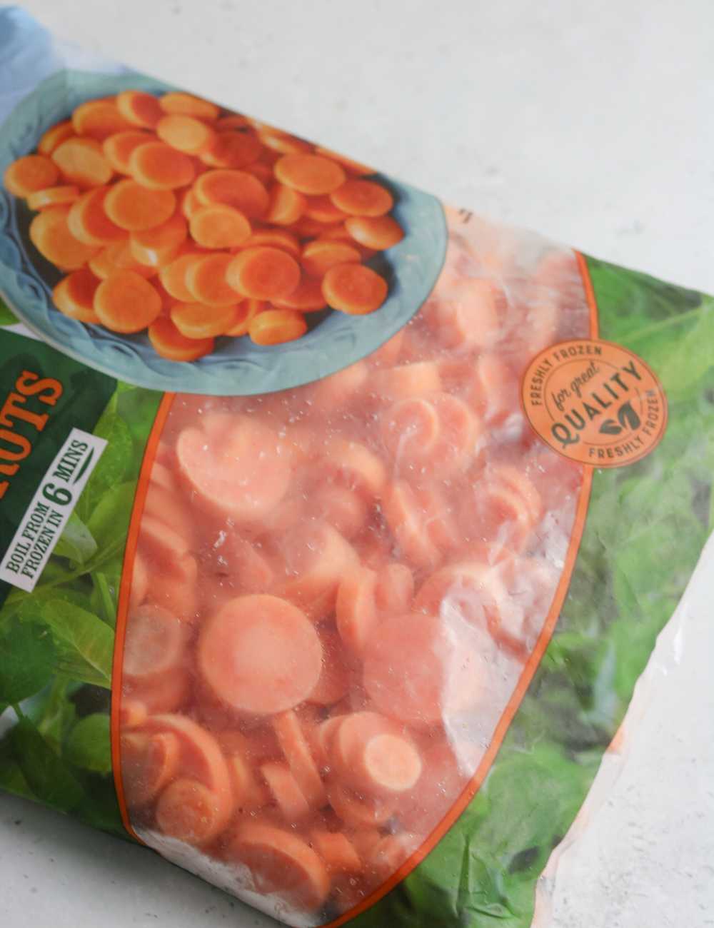 A bag of frozen carrots.